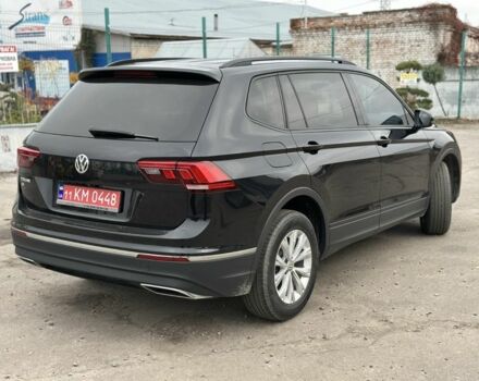 Чорний Фольксваген Тігуан, об'ємом двигуна 2 л та пробігом 139 тис. км за 16900 $, фото 3 на Automoto.ua