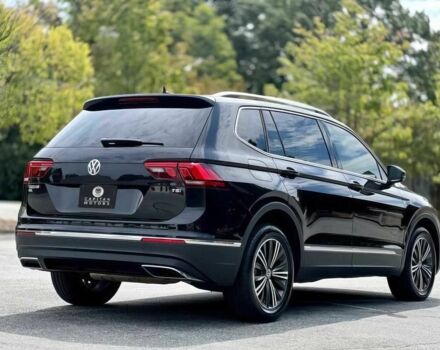 Чорний Фольксваген Тігуан, об'ємом двигуна 2 л та пробігом 37 тис. км за 4000 $, фото 6 на Automoto.ua