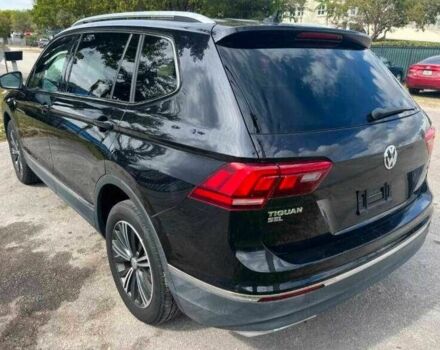 Чорний Фольксваген Тігуан, об'ємом двигуна 2 л та пробігом 34 тис. км за 4600 $, фото 1 на Automoto.ua