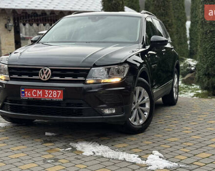 Чорний Фольксваген Тігуан, об'ємом двигуна 1.98 л та пробігом 258 тис. км за 23300 $, фото 1 на Automoto.ua