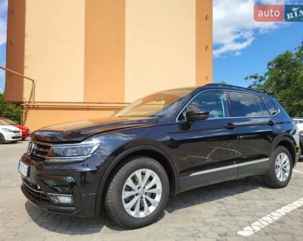 Чорний Фольксваген Тігуан, об'ємом двигуна 2 л та пробігом 101 тис. км за 21000 $, фото 2 на Automoto.ua