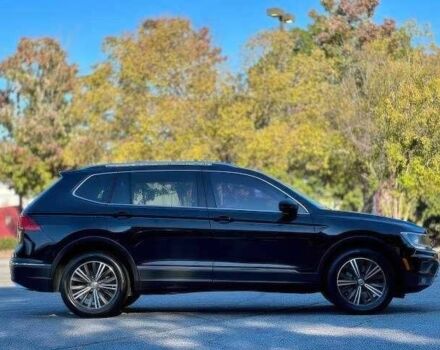 Черный Фольксваген Тигуан, объемом двигателя 2 л и пробегом 89 тыс. км за 11000 $, фото 3 на Automoto.ua