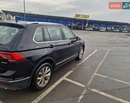 Черный Фольксваген Тигуан, объемом двигателя 1.98 л и пробегом 243 тыс. км за 23310 $, фото 3 на Automoto.ua