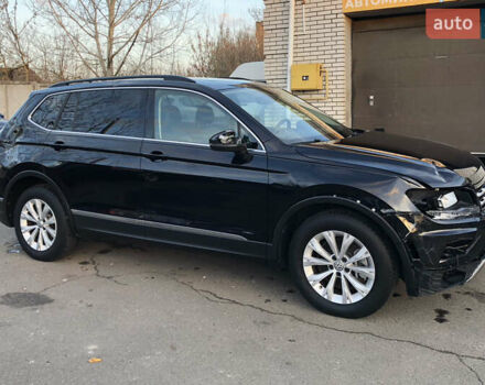 Черный Фольксваген Тигуан, объемом двигателя 2 л и пробегом 188 тыс. км за 12890 $, фото 6 на Automoto.ua
