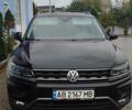 Чорний Фольксваген Тігуан, об'ємом двигуна 2 л та пробігом 260 тис. км за 24950 $, фото 1 на Automoto.ua