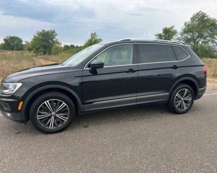 Чорний Фольксваген Тігуан, об'ємом двигуна 2 л та пробігом 71 тис. км за 7000 $, фото 1 на Automoto.ua
