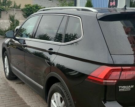 Чорний Фольксваген Тігуан, об'ємом двигуна 2 л та пробігом 260 тис. км за 24950 $, фото 5 на Automoto.ua