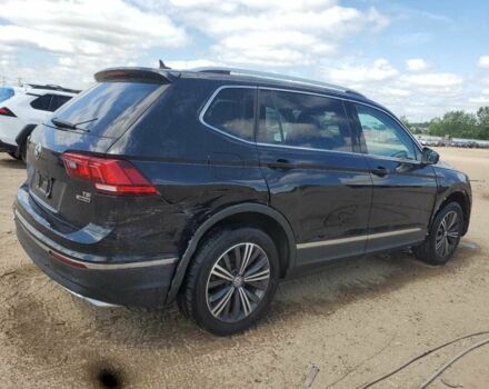 Черный Фольксваген Тигуан, объемом двигателя 2 л и пробегом 65 тыс. км за 4000 $, фото 2 на Automoto.ua