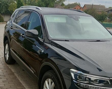 Чорний Фольксваген Тігуан, об'ємом двигуна 2 л та пробігом 260 тис. км за 24950 $, фото 1 на Automoto.ua