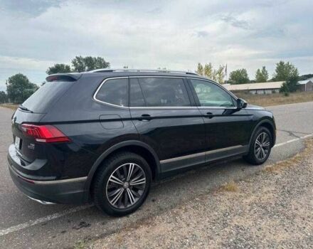 Чорний Фольксваген Тігуан, об'ємом двигуна 2 л та пробігом 71 тис. км за 7000 $, фото 4 на Automoto.ua