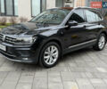 Чорний Фольксваген Тігуан, об'ємом двигуна 2 л та пробігом 208 тис. км за 23800 $, фото 1 на Automoto.ua