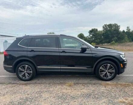 Чорний Фольксваген Тігуан, об'ємом двигуна 2 л та пробігом 71 тис. км за 7000 $, фото 5 на Automoto.ua