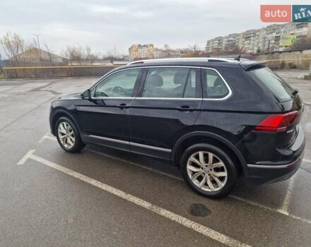 Черный Фольксваген Тигуан, объемом двигателя 1.98 л и пробегом 243 тыс. км за 23310 $, фото 1 на Automoto.ua