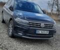 Чорний Фольксваген Тігуан, об'ємом двигуна 2 л та пробігом 181 тис. км за 28200 $, фото 1 на Automoto.ua