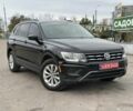 Чорний Фольксваген Тігуан, об'ємом двигуна 2 л та пробігом 139 тис. км за 16900 $, фото 1 на Automoto.ua