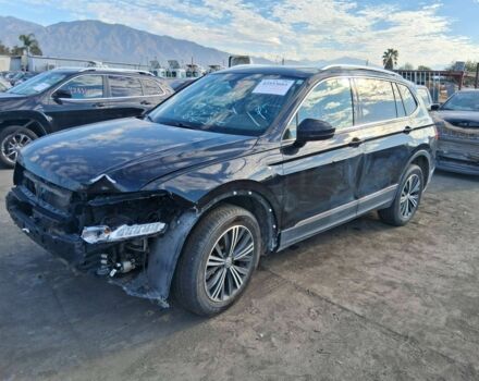 Черный Фольксваген Тигуан, объемом двигателя 2 л и пробегом 129 тыс. км за 13900 $, фото 2 на Automoto.ua