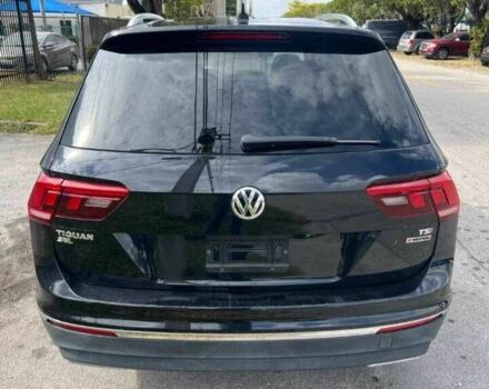 Чорний Фольксваген Тігуан, об'ємом двигуна 2 л та пробігом 34 тис. км за 4600 $, фото 2 на Automoto.ua