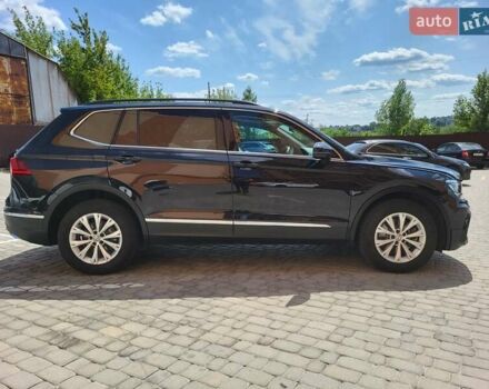 Чорний Фольксваген Тігуан, об'ємом двигуна 2 л та пробігом 101 тис. км за 21000 $, фото 5 на Automoto.ua
