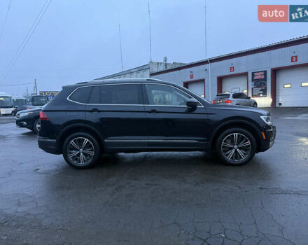 Чорний Фольксваген Тігуан, об'ємом двигуна 2 л та пробігом 162 тис. км за 18750 $, фото 2 на Automoto.ua