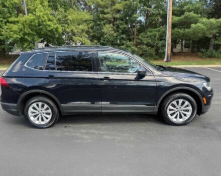 Черный Фольксваген Тигуан, объемом двигателя 2 л и пробегом 37 тыс. км за 13000 $, фото 2 на Automoto.ua