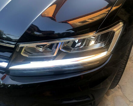 Черный Фольксваген Тигуан, объемом двигателя 2 л и пробегом 258 тыс. км за 21000 $, фото 2 на Automoto.ua