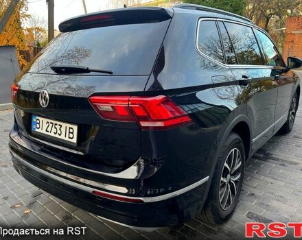 Черный Фольксваген Тигуан, объемом двигателя 2 л и пробегом 133 тыс. км за 22000 $, фото 5 на Automoto.ua