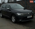 Черный Фольксваген Тигуан, объемом двигателя 1.98 л и пробегом 220 тыс. км за 26500 $, фото 1 на Automoto.ua