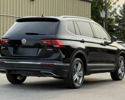 Чорний Фольксваген Тігуан, об'ємом двигуна 2 л та пробігом 34 тис. км за 11300 $, фото 3 на Automoto.ua