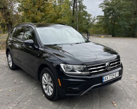 Черный Фольксваген Тигуан, объемом двигателя 2 л и пробегом 129 тыс. км за 19000 $, фото 1 на Automoto.ua