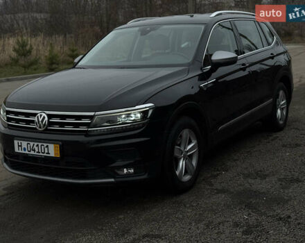Черный Фольксваген Тигуан, объемом двигателя 1.98 л и пробегом 220 тыс. км за 26500 $, фото 2 на Automoto.ua