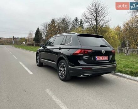 Чорний Фольксваген Тігуан, об'ємом двигуна 2 л та пробігом 124 тис. км за 19500 $, фото 101 на Automoto.ua