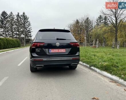 Чорний Фольксваген Тігуан, об'ємом двигуна 2 л та пробігом 124 тис. км за 19500 $, фото 105 на Automoto.ua
