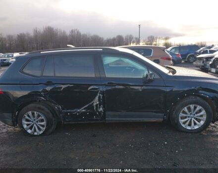 Чорний Фольксваген Тігуан, об'ємом двигуна 2 л та пробігом 115 тис. км за 10100 $, фото 6 на Automoto.ua