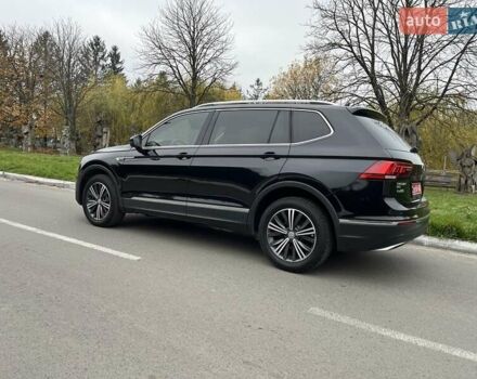 Чорний Фольксваген Тігуан, об'ємом двигуна 2 л та пробігом 124 тис. км за 19500 $, фото 100 на Automoto.ua