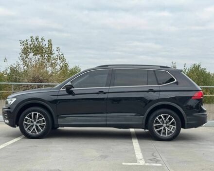 Чорний Фольксваген Тігуан, об'ємом двигуна 2 л та пробігом 117 тис. км за 19650 $, фото 4 на Automoto.ua