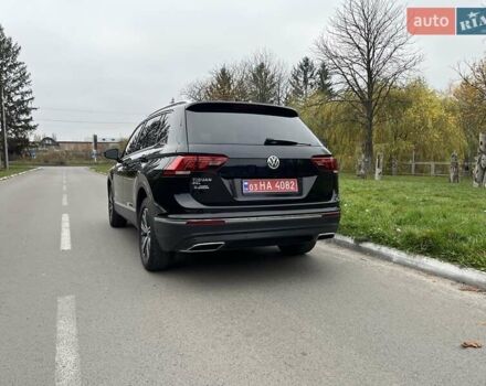Чорний Фольксваген Тігуан, об'ємом двигуна 2 л та пробігом 124 тис. км за 19500 $, фото 104 на Automoto.ua
