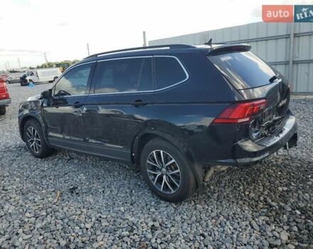 Черный Фольксваген Тигуан, объемом двигателя 2 л и пробегом 138 тыс. км за 12490 $, фото 1 на Automoto.ua