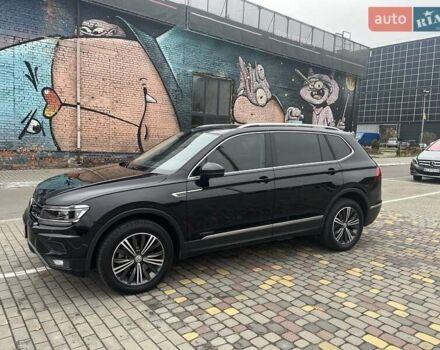 Чорний Фольксваген Тігуан, об'ємом двигуна 2 л та пробігом 124 тис. км за 19500 $, фото 2 на Automoto.ua
