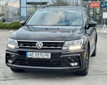 Чорний Фольксваген Тігуан, об'ємом двигуна 2 л та пробігом 74 тис. км за 19900 $, фото 2 на Automoto.ua