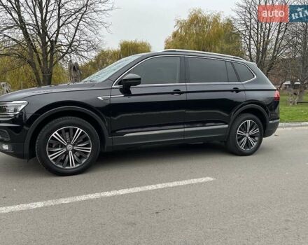 Чорний Фольксваген Тігуан, об'ємом двигуна 2 л та пробігом 124 тис. км за 19500 $, фото 102 на Automoto.ua