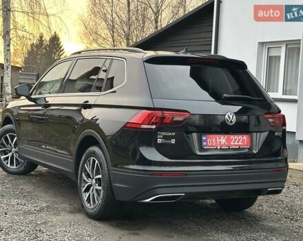 Чорний Фольксваген Тігуан, об'ємом двигуна 2 л та пробігом 200 тис. км за 15900 $, фото 5 на Automoto.ua