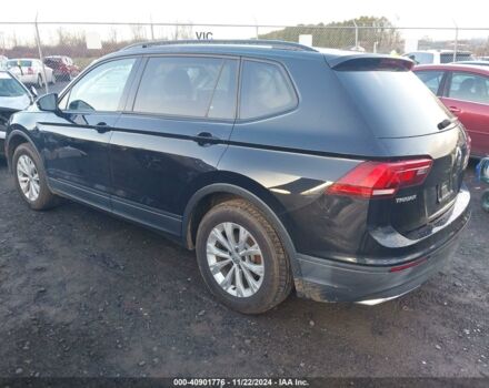 Чорний Фольксваген Тігуан, об'ємом двигуна 2 л та пробігом 115 тис. км за 10100 $, фото 3 на Automoto.ua