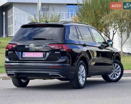 Чорний Фольксваген Тігуан, об'ємом двигуна 2 л та пробігом 109 тис. км за 18950 $, фото 1 на Automoto.ua