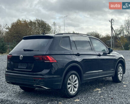 Черный Фольксваген Тигуан, объемом двигателя 2 л и пробегом 160 тыс. км за 12000 $, фото 5 на Automoto.ua