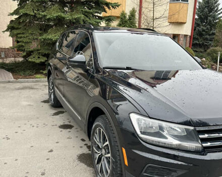 Черный Фольксваген Тигуан, объемом двигателя 2 л и пробегом 130 тыс. км за 18500 $, фото 1 на Automoto.ua