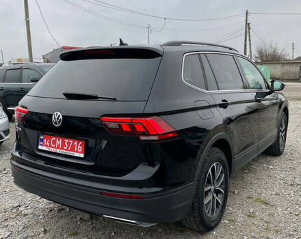 Черный Фольксваген Тигуан, объемом двигателя 2 л и пробегом 183 тыс. км за 19600 $, фото 4 на Automoto.ua