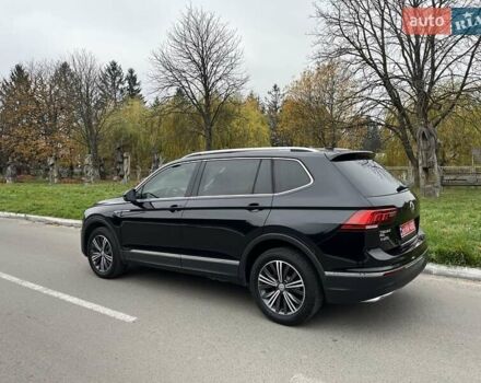 Чорний Фольксваген Тігуан, об'ємом двигуна 2 л та пробігом 124 тис. км за 19500 $, фото 72 на Automoto.ua