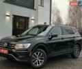 Чорний Фольксваген Тігуан, об'ємом двигуна 2 л та пробігом 200 тис. км за 15900 $, фото 2 на Automoto.ua
