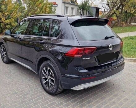 Черный Фольксваген Тигуан, объемом двигателя 2 л и пробегом 103 тыс. км за 15000 $, фото 2 на Automoto.ua