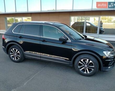 Чорний Фольксваген Тігуан, об'ємом двигуна 1.97 л та пробігом 197 тис. км за 23000 $, фото 1 на Automoto.ua